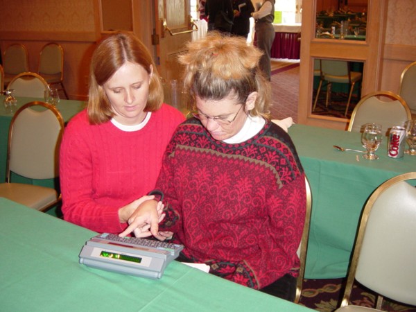 Peyton and her friend, Jodi, typing